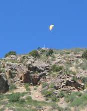 Hang glider riding wind currents on Lookout Mountain