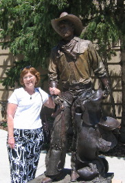 Joyce Hendrix & Bronze Cowboy on display at Leanin' Tree Museum of Western Art