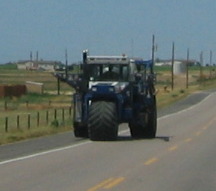Farm Tractor changing fields near Greeley, Colorado