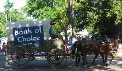 Bank sponsored wagon in the Greeley, Colorado 4th of July Stampede Rodeo Parade