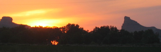 Sun setting over Mitchell Pass and Scotts Bluff