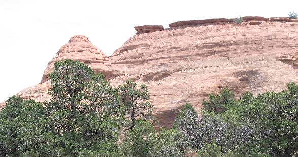 Kayenta formation caprock protecting Wingate Sandstone