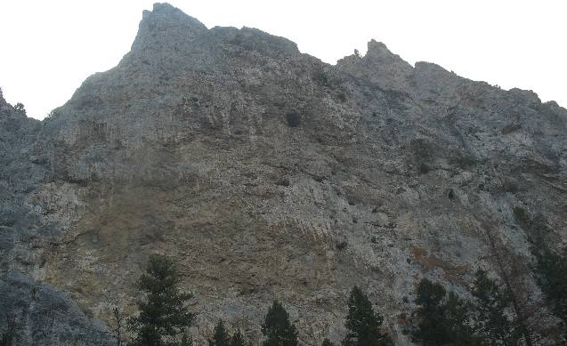 Cavities and caves visible in limestone cliffs 