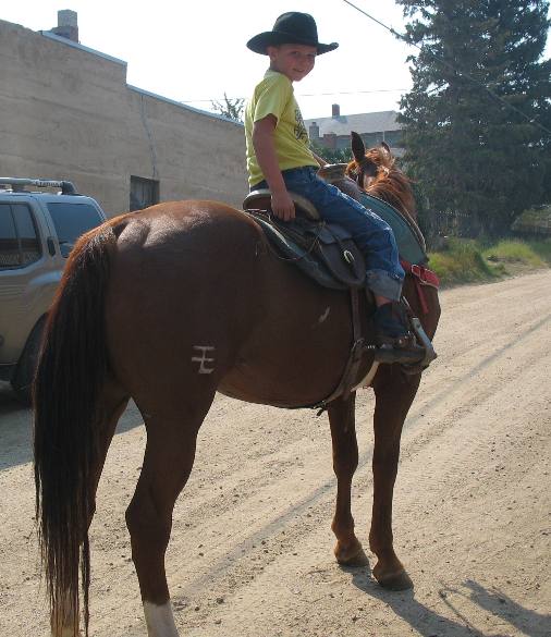 Nine year old Montana cowboy visiting Virginia City on his horse