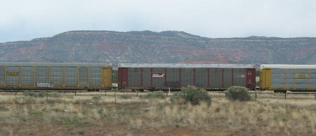 Train and a mesa along 1-40 west of Albuquerque