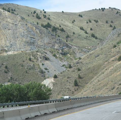 Mine shaft and tailings visible from I-84 southeast of Baker City