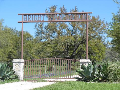Love the century plants at this Texas Hill Country Ranch Gate