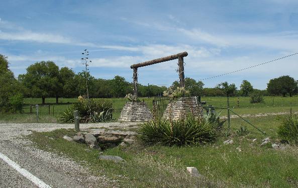 Matching yucca on both sides of this Hill Country Ranch Gate