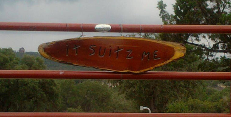 Texas Ranch Gate with unique orignal sign on SR-16 near Pipe Creek east of Bandera