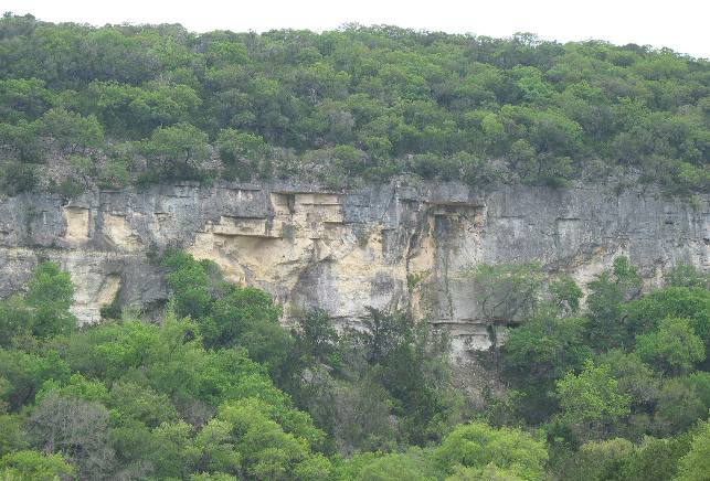 Limestone cliff cut & exposed by the Guadalupe River near Hunt, Texas