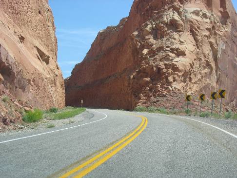 Awesome roadcut passing through sandstone on Comb Ridge