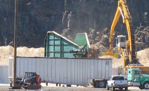 Unloading barge load of woodchips at Wilma Port Facility near Clarkston, Washington