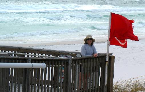 Joyce Hendrix warning flags at Henderson Beach State Park