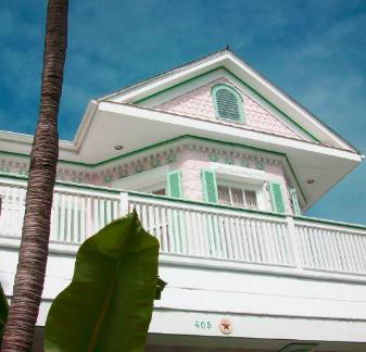 Gingerbreak architecture and Island Colors displayed on this Key West house