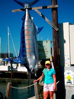 Joyce Hendrix with large Blue Marlin at Key West Bight Marina