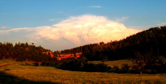 Cumulous clouds building over the Black Hills