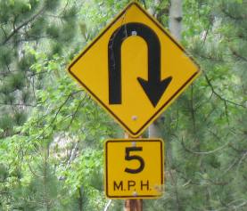 This is a real hairpin turn sign