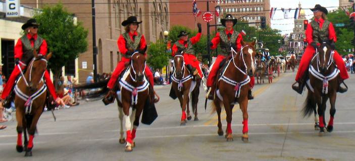 red shirt & pants girls in Cheyenne Frontier Days Parade