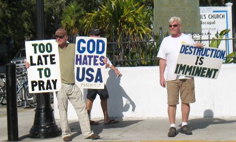"Sign Guy" with buddy "God Hates USA"