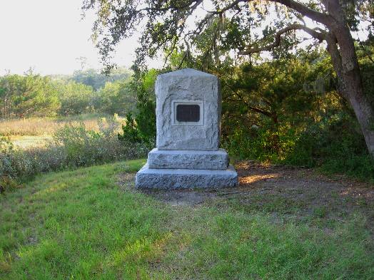 Granite monument on St. Simons Island commemorating the victory of James Oglethorpe's forces over a Spanish invasion force at the Battle of Bloody Marsh. The monument is on dry land at the edge of the marsh where the July 1742 battle was fought.