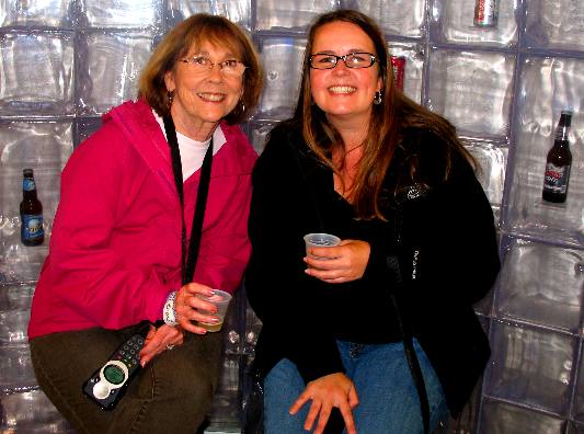Joyce Hendrix and Rachel Longville sharing a "Canon" moment on the Coors Brewery Tour