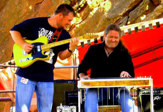 Craig Campbell's lead guitar player and steel player performing at Red Rocks Ampitheatre