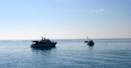 Three private boats anchored out at Garden Key in the Dry Tortugas