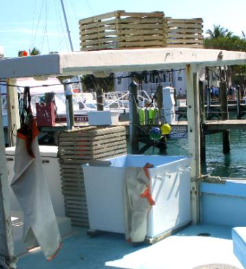 Lobster traps and heavy duty aprons on this lobster boat in Key West