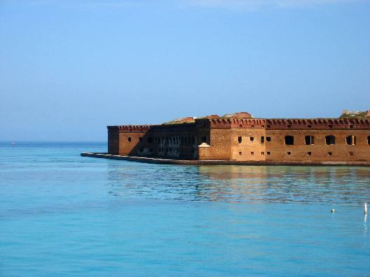 Fort Jefferson was built to protect one of the most strategic deepwater anchorages in North America. By fortifying this spacious harbor, the United States maintained an important “advance post” for ships patrolling the Gulf of Mexico and the Straits of Florida. Nestled within the islands and shoals that make up the Dry Tortugas, the harbor offered ships the chance to re– supply, refit, or seek refuge from storms. The location of the Tortugas along one the world’s busiest shipping lanes was its greatest military asset. Though passing ships could easily avoid the largest of Fort Jefferson’s guns, they could not avoid the warships that used its harbor.