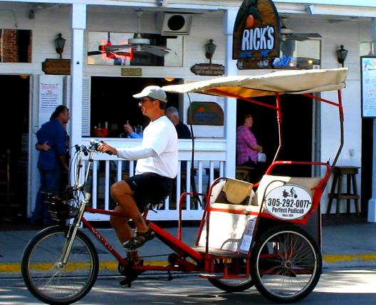Empty pedicab on Duval Street in Key West