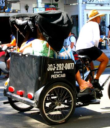 Fully loaded pedicab on Duval Street in Key West