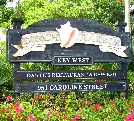 Sign outside Dante's Restaurant & Raw Bar on Caroline Street in Key West