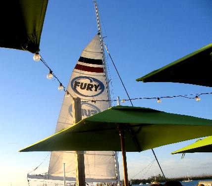 Fury sunset cruise sail boat passing Sunset Pier