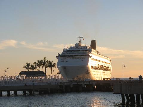 Cruise ship leaving Key West at sunset