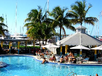 swimming pool at Dante's with Harbor Walk and the Conch Harbor Marina