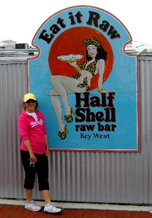 Joyce Hendrix & the Half Shell Raw Bar sign on Harbor Walk at Key West Bight Marina