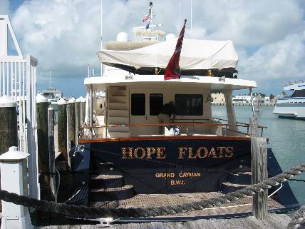 The Yacht Hope Floats docked at Conch Harbor Marina behind Dantes along Harbor Walk