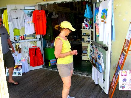 Joyce Hendrix window shopping along Harbor Walk in Key West