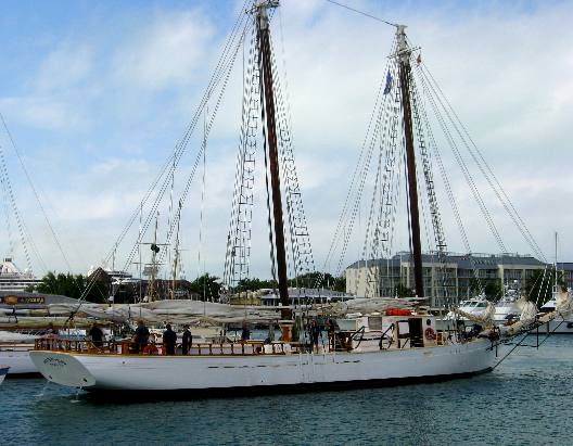 Tall sailing ship Western Union backing into birth in Key West Bight Marina 