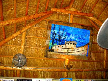 Thatched roof over dining area at Hogfish Grill on Stock Island