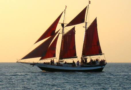 Jolly II Rover sailing past Sunset Pier in Key West