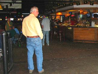 Mike Hendrix scoping out the poker tables at the Outlaw Saloon in Cheyenne