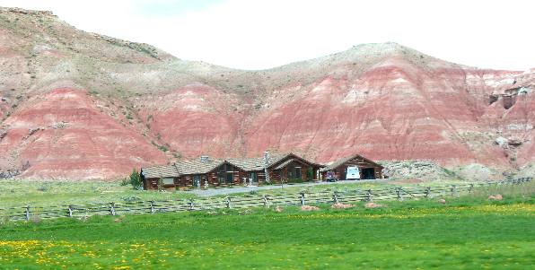 Beautiful ranch house with Chugwater Formation exposed in the background