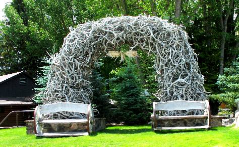 Elk horn arch in front of hotel across street from Greater Yellowstone Visitor Center in Jackson, Wyoming