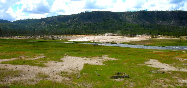 Firehole River flowing through Geyser Basin in Yellowstone National Park