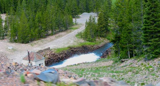 View from top of Grassy Lake Dam looking down at the outflow