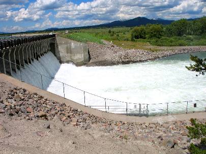 Jackson Lake Dam with the Snake River flowing south through Grand Teton National Park