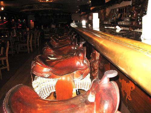 Millon Dollar Cowboy Bar saddle bar stools