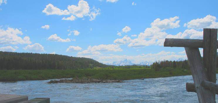 View of Grand Teton Mountain looking down Buffalo Valley from bridge across Buffalo Fork of the Snake River near Turpin Meadow Campground and Trailhead