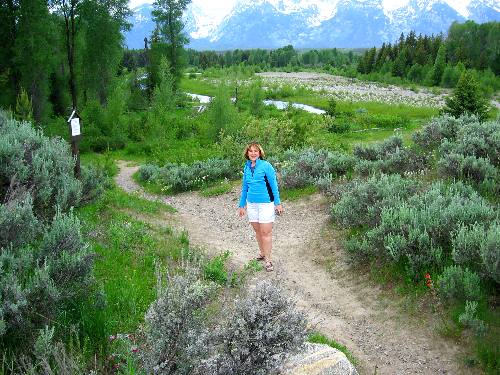 Joyce on the trail at Schwabacher Landing that leads to Beaver Pond
